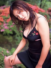 Long haired asian babe looks incredible with her busty boobs